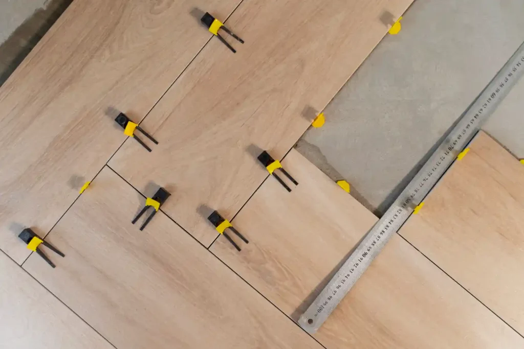 Professional residential and commercial flooring installation services including laminate, hardwood, and carpet flooring for a flawless finish